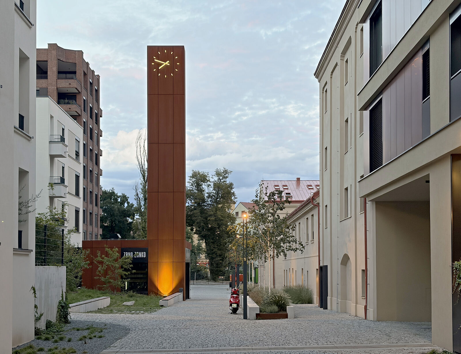 Lane with the corten clock tower