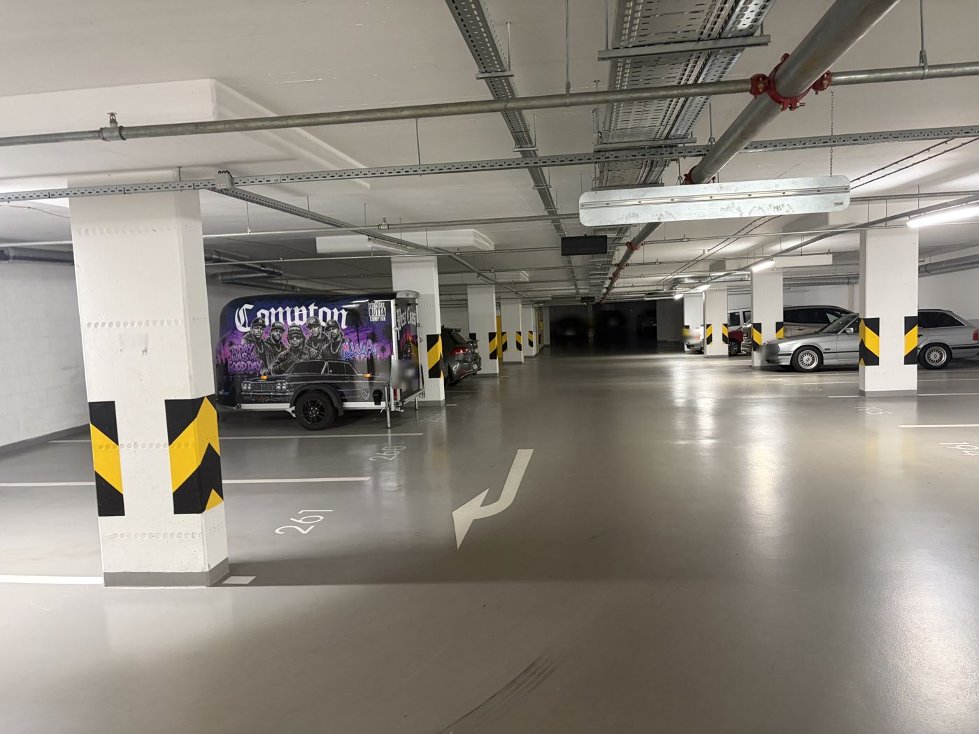 At the bottom of the ramp on level −2 turn left twice straight away and look for